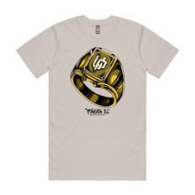 White-shirt-with-gold-ring-and-U-P-Logo-on-center-of-the-ring