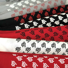 An-image-of-our-red-white,-gray,-and-black-UP-bandanas.